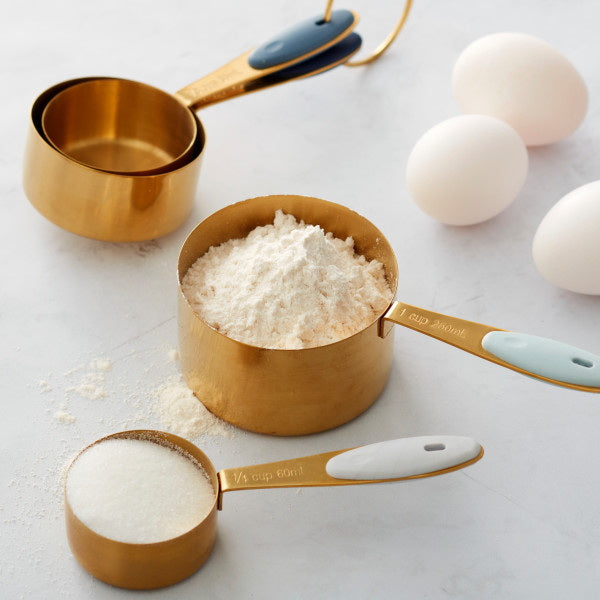 Tasses à mesurer bleu marine et or avec anneau à clipser, 4 pièces - Wilton - Tasse & Cuillère à mesurer - - La Guilde Culinaire