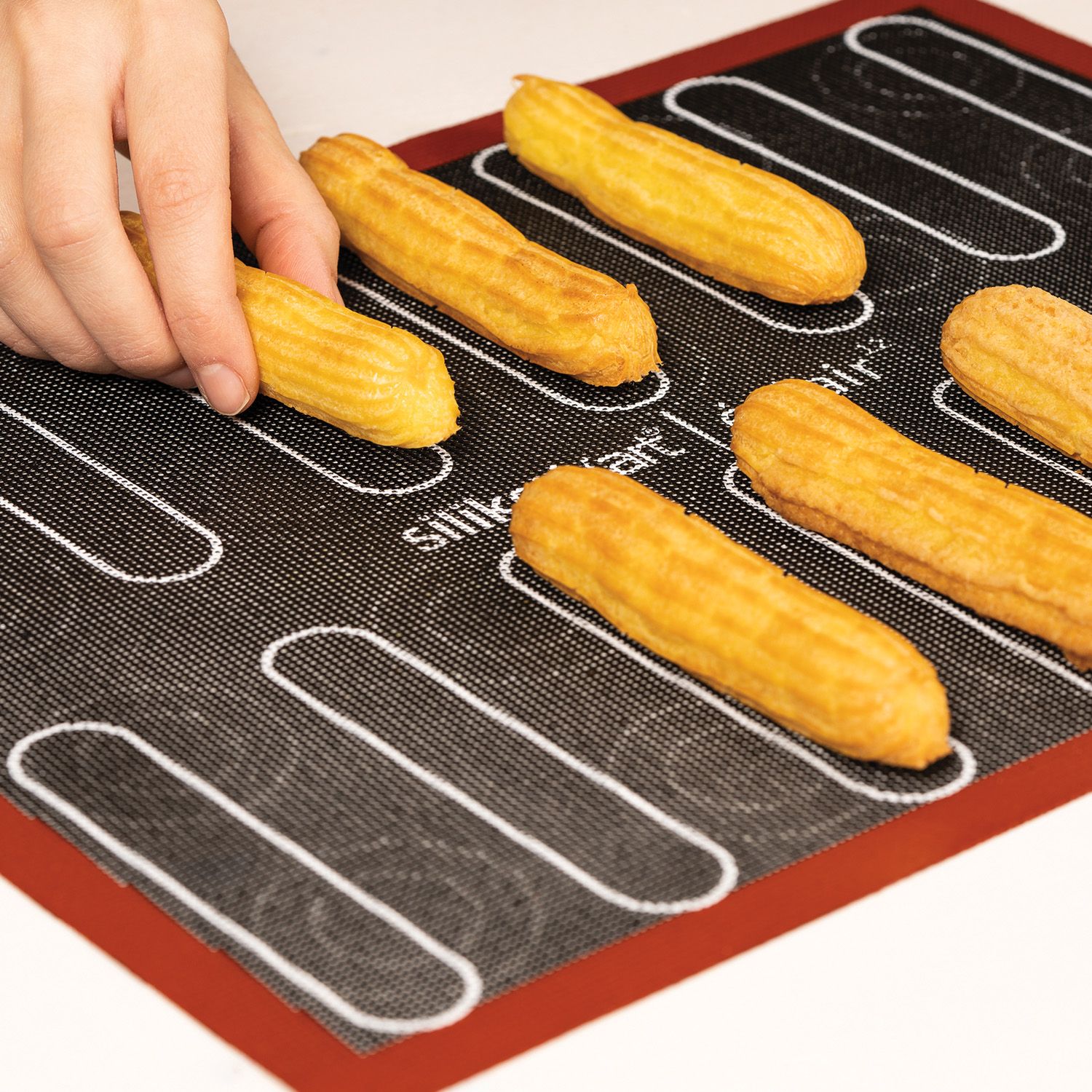 Éclair & choux mat - SilikoMart - Tapis de cuisson - - La Guilde Culinaire